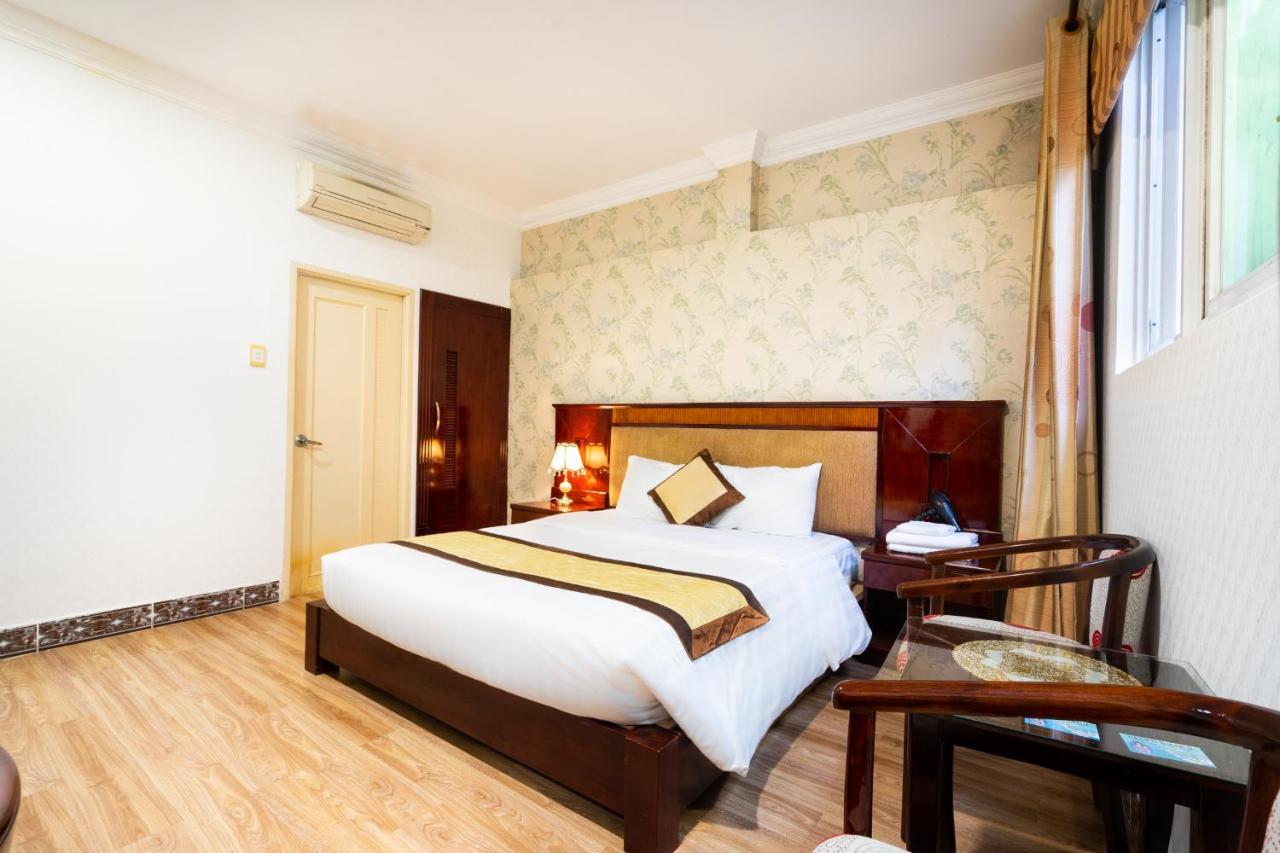 Cosmo Central Hotel Ho Chi Minh Exterior photo